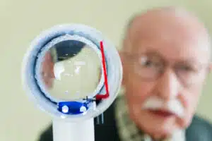 Senior man suffering with Macular Degeneration